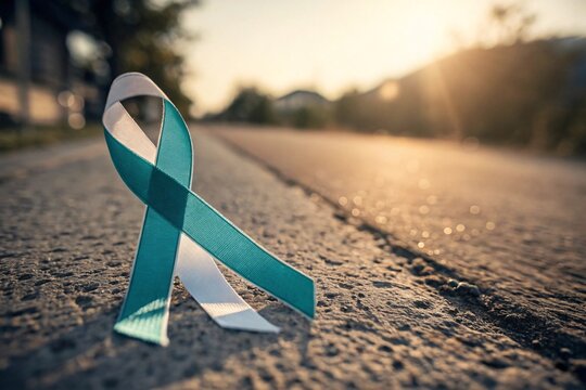 Teal and white cervical cancer awareness ribbon