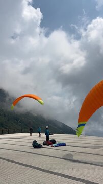 Paragliders over the Babadag mountain getting ready to fly