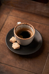 Cup of coffee on wooden background. Soft focus. Copy space	