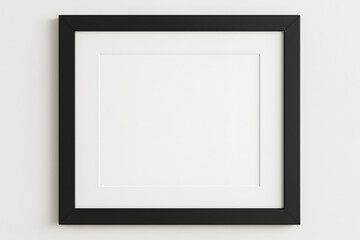 Fototapeta premium Artistic Frame Showcase: A captivating close-up reveals a sleek, black picture frame poised elegantly against the wall, presenting a blank canvas of opportunity.