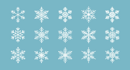 Beautiful white snowflakes on a serene blue background create a stunning winter wonderland pattern