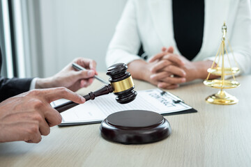 Professional Male lawyer or counselor discussing negotiation legal case with client meeting with...