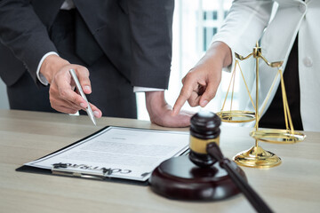 Professional Male lawyer or counselor discussing negotiation legal case with client meeting with...