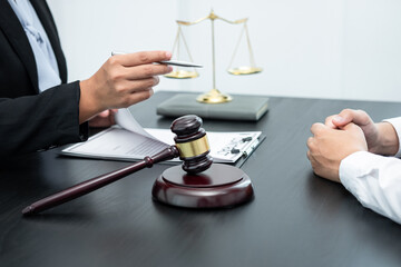 Professional Male lawyer or counselor discussing negotiation legal case with client meeting with...
