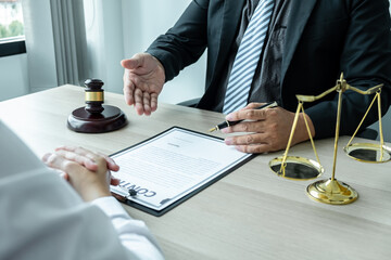 Professional Male lawyer or counselor discussing negotiation legal case with client meeting with...