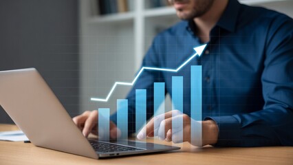 Boost your business strategies with a modern visual of rising profits and growth charts on a laptop screen, perfect for illustrating success and financial analytics, drive results
