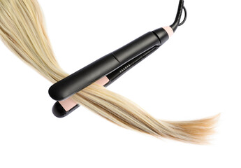 Naklejka premium Straightener with blonde hair lock isolated on white