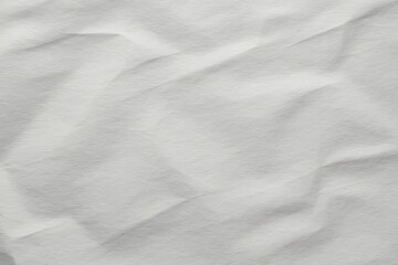 Obraz premium Abstract textured background with soft white fabric folds and shadows