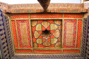 Painted and decorated wooden ceiling inside the Khan’s harem residence in Khiva, Uzbekistan