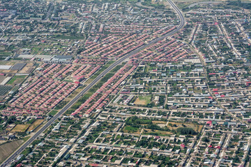 Modern part of Samarkand city seen from airplane during takeoff, Uzbekistan