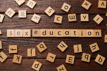 Phrase Sex Education made with wooden letters on table, flat lay