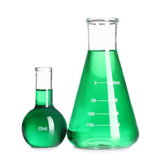 Laboratory glassware with green liquid isolated on white