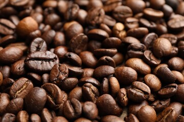 Aromatic coffee beans as background, closeup view