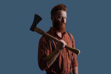 Hair and beard care. Handsome bearded brutal man. Beard styling with axe. Brutal Caucasian hipster...