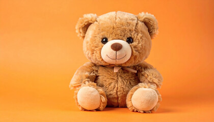 Fototapeta premium Cute Brown Teddy Bear Plush Toy on Orange Background, Adorable Soft Stuffed Animal, High-Resolution Toy Photography for Kids, Gifts, and Creative Projects