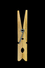 Wooden Clothespin Isolated on Black Background