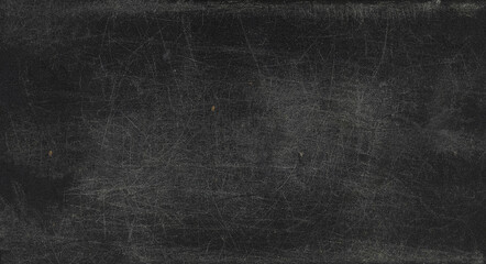 Scratched plastic surface with rough texture, seen up close
