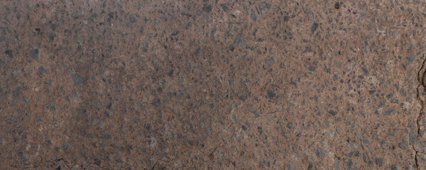 Close-up of brown stone surface with natural texture