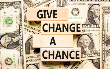 Give change a chance symbol. Concept words phrase Give change a chance on beautiful wooden blocks....