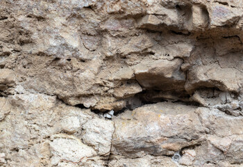 the structure of the rock surface in the section, quarrying in the natural environment, sunny day