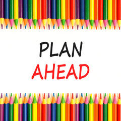 Plan ahead symbol. Concept word Plan ahead on beautiful white paper. Colored pencils. Beautiful white paper background. Business plan ahead concept. Copy space.