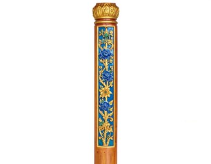 Ornate wooden column with blue floral carvings