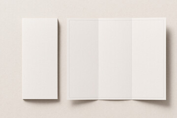 Blank, white, tri-fold brochure mockup shown both folded and unfolded