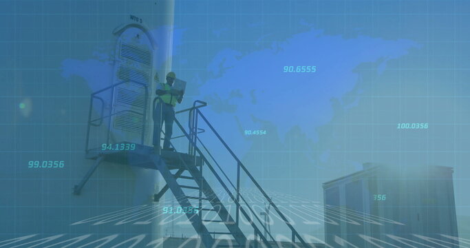 Inspecting NTU 5 tower, technician wearing safety vest and helmet on rooftop stairs with laptop - Powered by Adobe