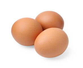 Three raw chicken eggs isolated on white