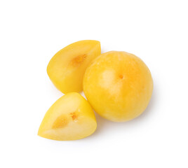 Whole and cut yellow cherry plums isolated on white, top view