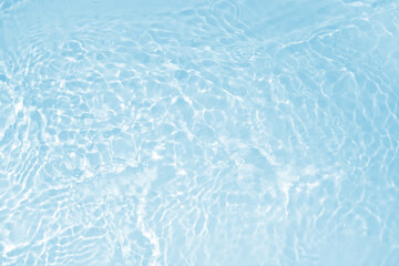 Background with clear blue water. Water background with small bubbles. transparent water surface with splashes and wave texture with ripples. Top view, a place to copy