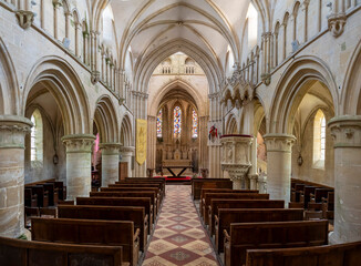 Langrune-Sur-Mer, France - 08 05 2025: Panoramic view of the central nave, the pulpit, hangings,...