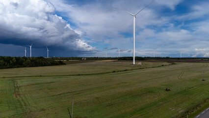 Wind turbine against dramatic stormy sky