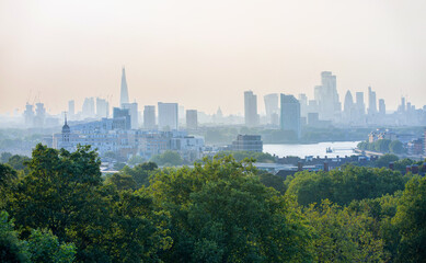 Obraz premium City of London at sunset including The Shard of Glass, view from the Greenwich hill.