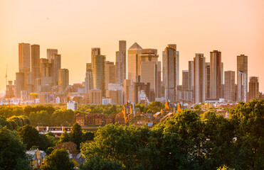 Canary Wharf, financial and business downtown in London at sunset,  view from the Greenwich hill.