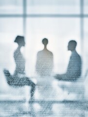 Team of young professional people concentrating on documents, working together in office 