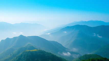 Naklejka premium Aerial View of Misty Green Mountains