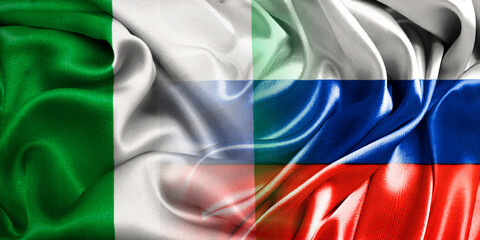 The national flags of Russia and Nigeria are combined into one and placed side by side on a fluttering cotton background. Flags.