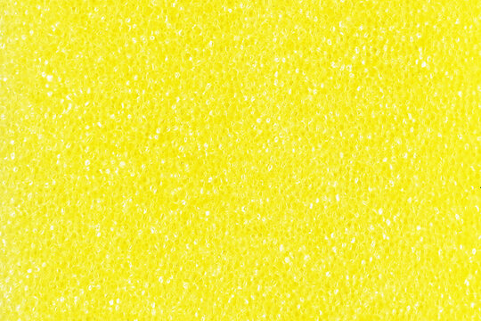 Yellow spone texture background. Cleaning washing concept.