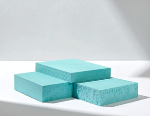 Stack of blue and green cubes on white background