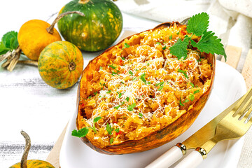 Baked spaghetti squash with spices, herbs and tomato sauce. Gluten free food, healthy dinner, vegan