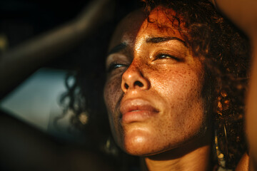 Frustrated young black woman inside car feeling hot,trying to adjust settings n dashboard. African amerian female checking temperaure of air condition in veicle