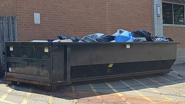 Large Roll Off Dumpster Full of Trash Metal Garbage Container Black Waste Heap Pick Up Delivery Collection Service Construction Renovation Municipal Recycling Management Containment 2