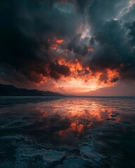 Dramatic Sunset Over Calm Water with Reflective Sky