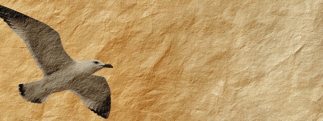 Bird in flight against textured golden backdrop