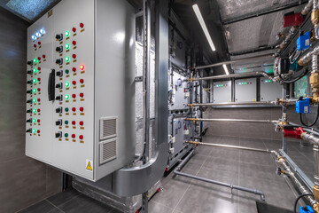 A modern control area showcases sophisticated machinery with illuminated panels and intricate...