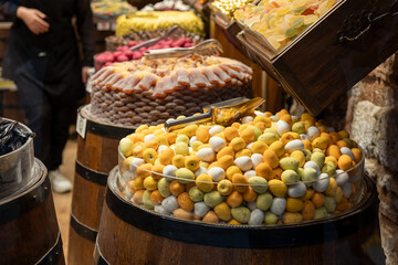 A vibrant display of assorted sweets, showcasing different flavors and textures in an inviting setting. Traditional Turkish sweets are ready for sale in the shop.