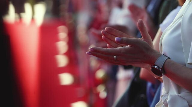 Actors, celebrities and stars on red carpet, guests and fans cheer an clapping hands, welcome, applause and ovation on cinema movie premiere, film festival award ceremony, ropes and golden barriers