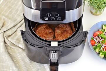 Cooking meat in an air fryer without oil. Air fryer paper.