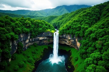 Dramatic aerial view of Akaka Falls, vibrant green foliage, powerful, paradise, vibrant colors